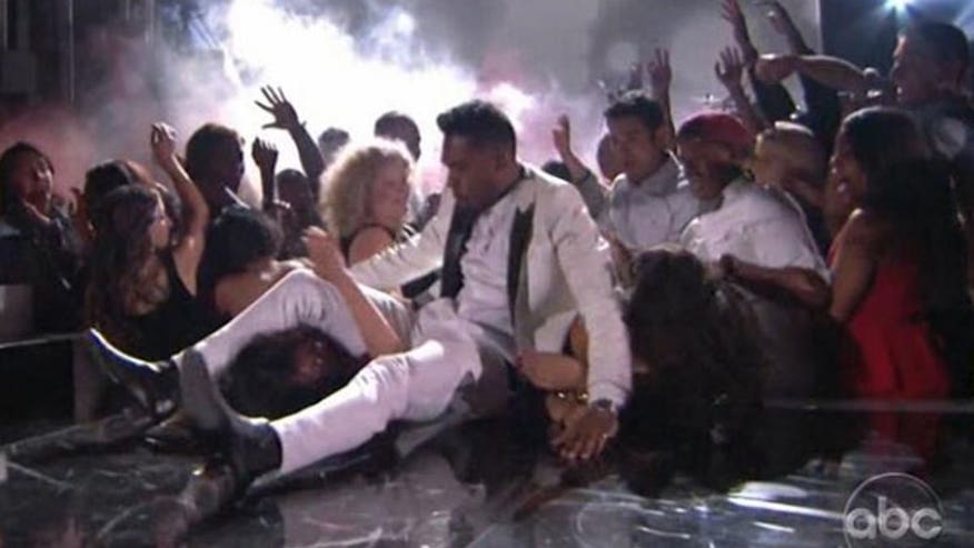 miguel-crushes-neck-woman-billboards-ftr